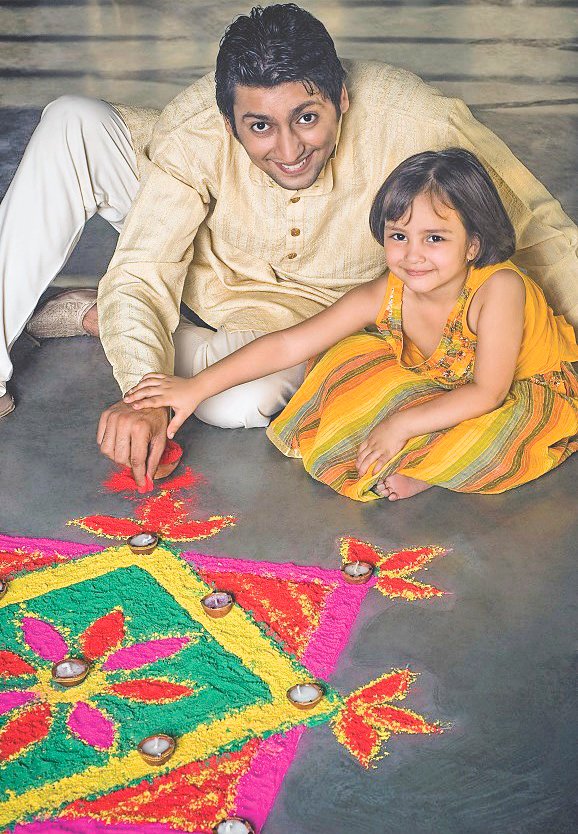 A father in Mumbai creates a rangoli design with his daughter on Dipavali. By having fun with her, he builds a relationship of trust, affection and cooperation.