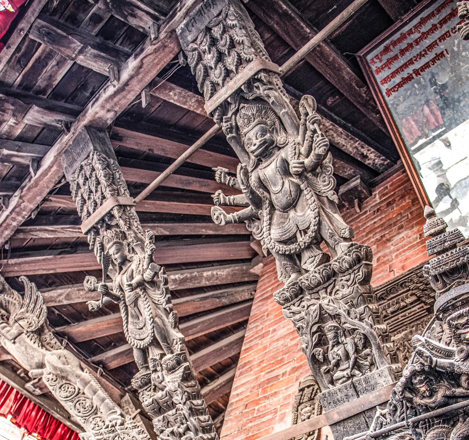 Sober reality: (clockwise from far left) A Deity is secured with an iron band around the waist to deter theft; wooden struts are similarly protected; a girl bows to the bodiless feet of an unknown God in Handigaon