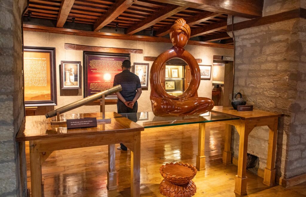 (left) Swami Shuddhidananda, president of Advaita Ashrama; (above) the ashram’s museum dedicated to Swami Vivekananda