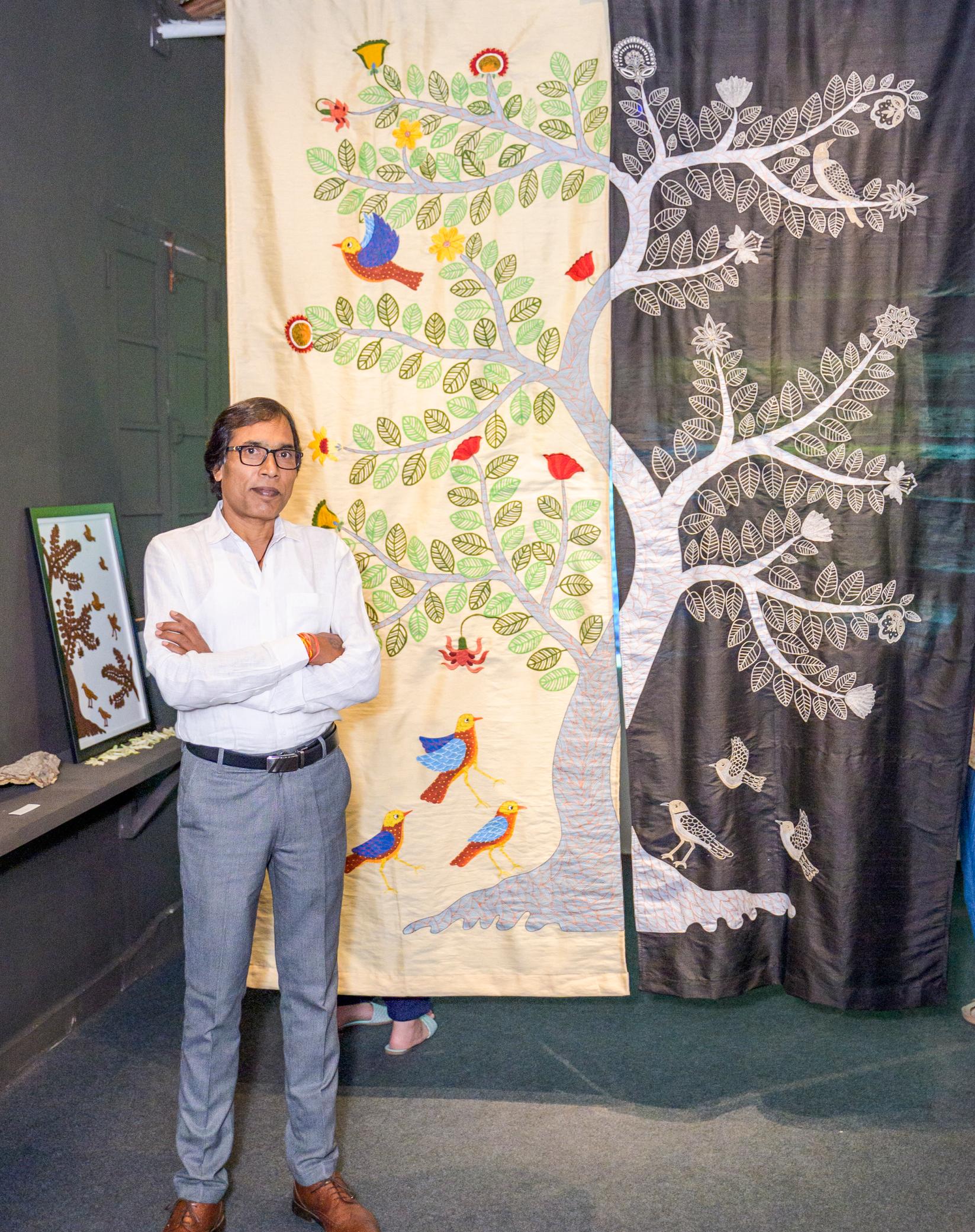 Art: (left) Padma Shri awardee Bhajju Shyam adds fine details and patterns to a Gond painting; (above left) Venkat Singh Shyam with a large textile work; (above right) Gond art by Venkat rendered in Chamba Rumal embroidery by Padma Shri Lalita Vakil for a Bridge Bharat collaboration.